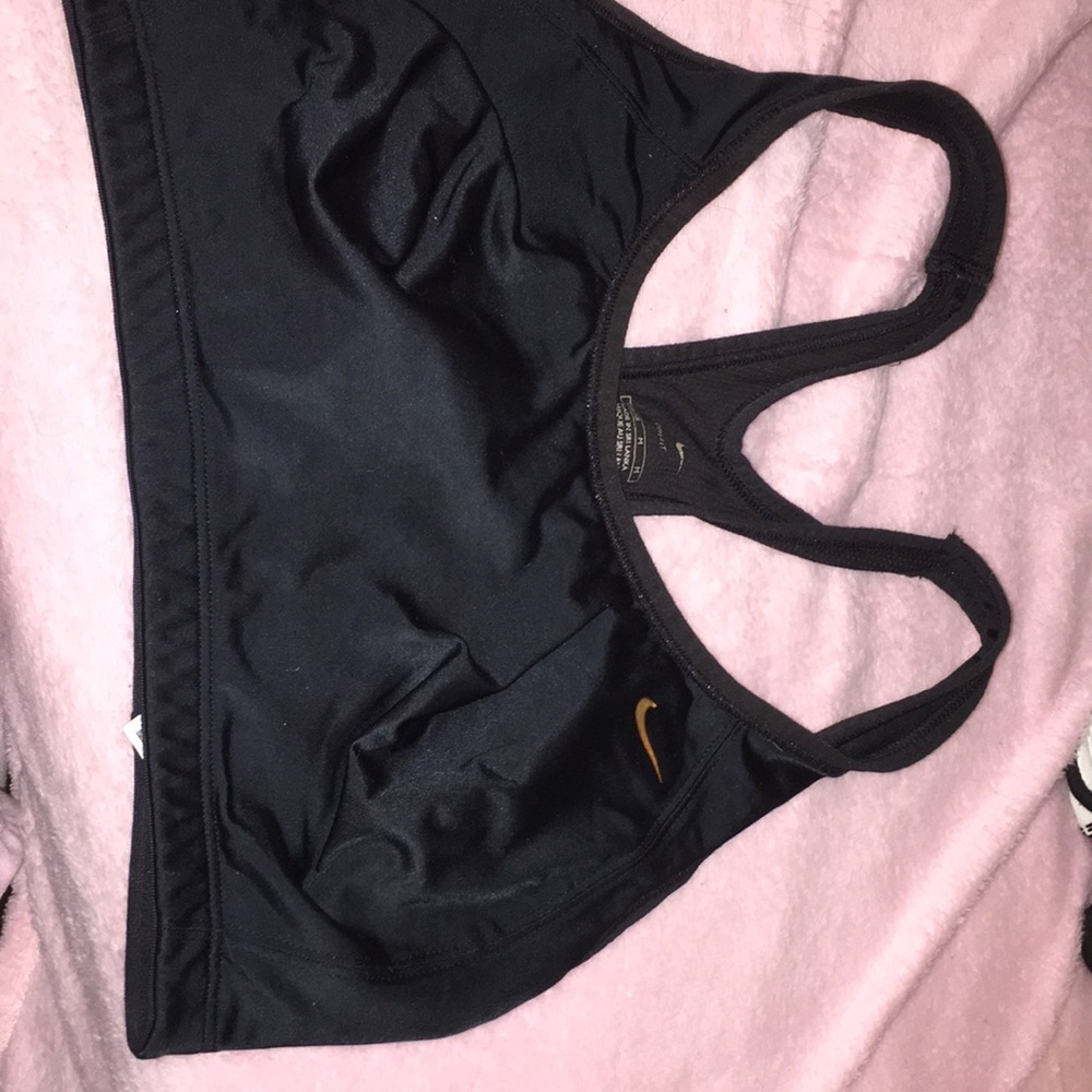 Black and gold Nike sports bra